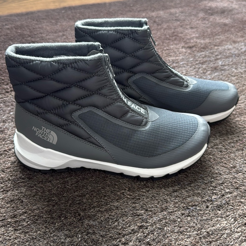 The North Face Gray zip up boots. Size 7.